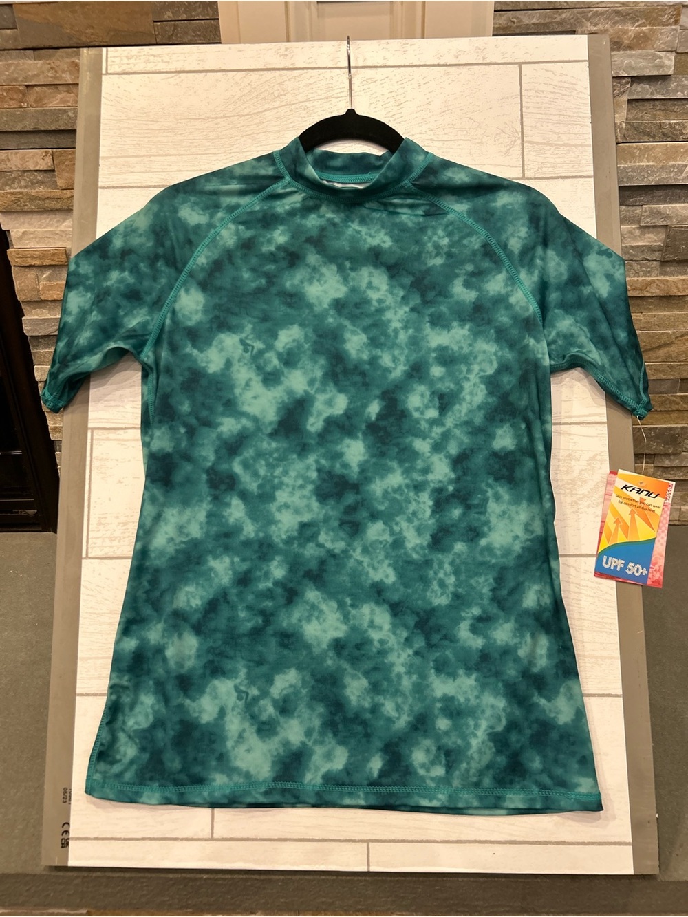 Men’s Kanu Surf Teal Short Sleeve Swim Top